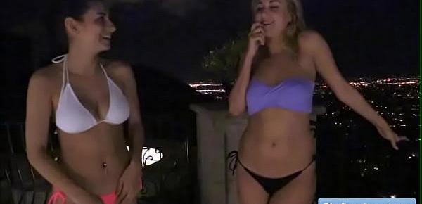  Gorgeous brunette amateur Nina kissing tender with her sexy blonde friend at night in the Jacuzzi